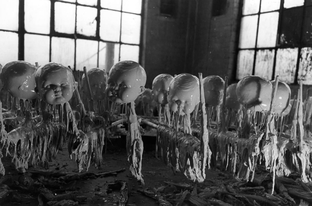 Try to look at these photos of doll factories without screaming!