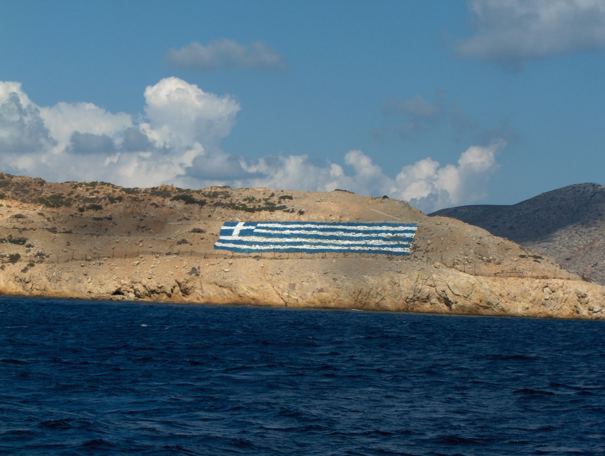 Greek flag on the rocks.